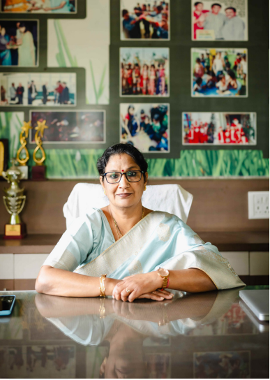 Principal of Colours School delivering message about education and student development