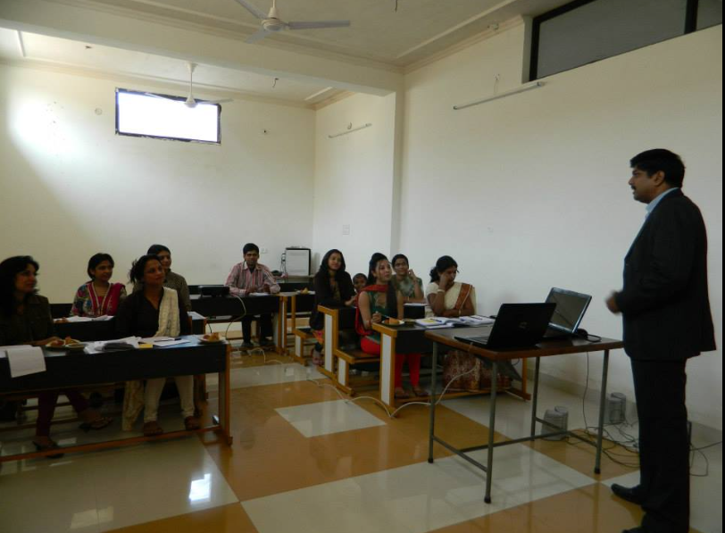 Parents interacting with school staff during admission process at Colours International School Jaipur