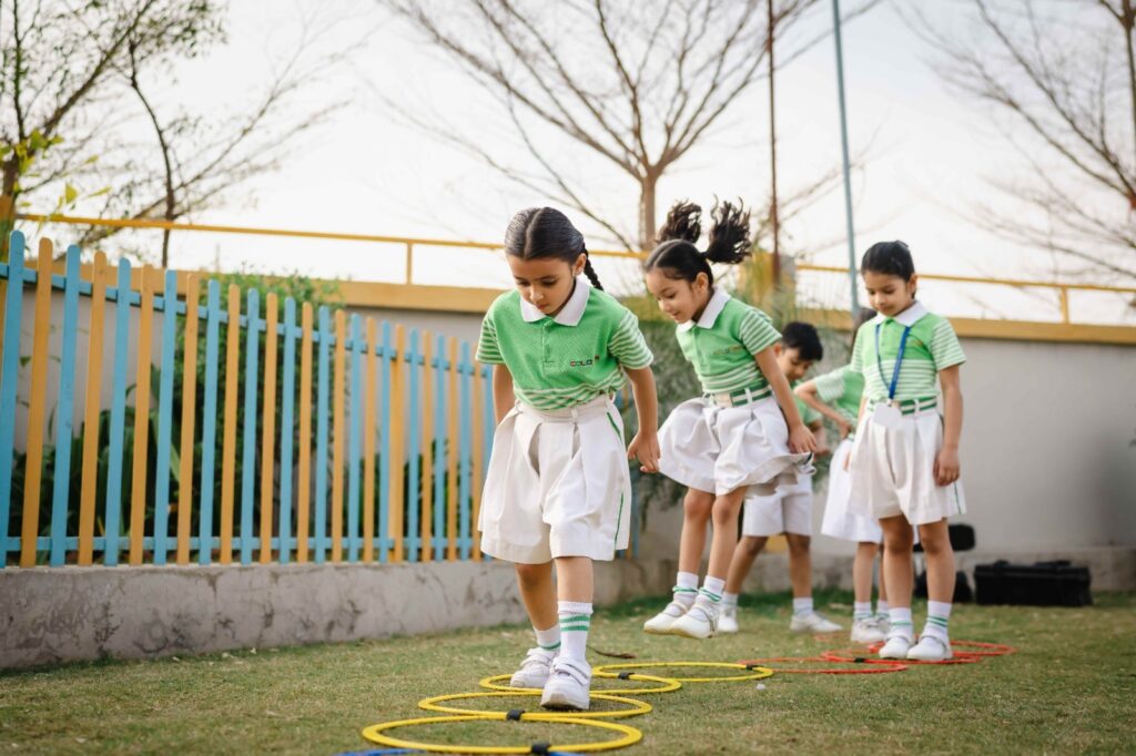 Students playing sports at Colours International School playground Jaipur