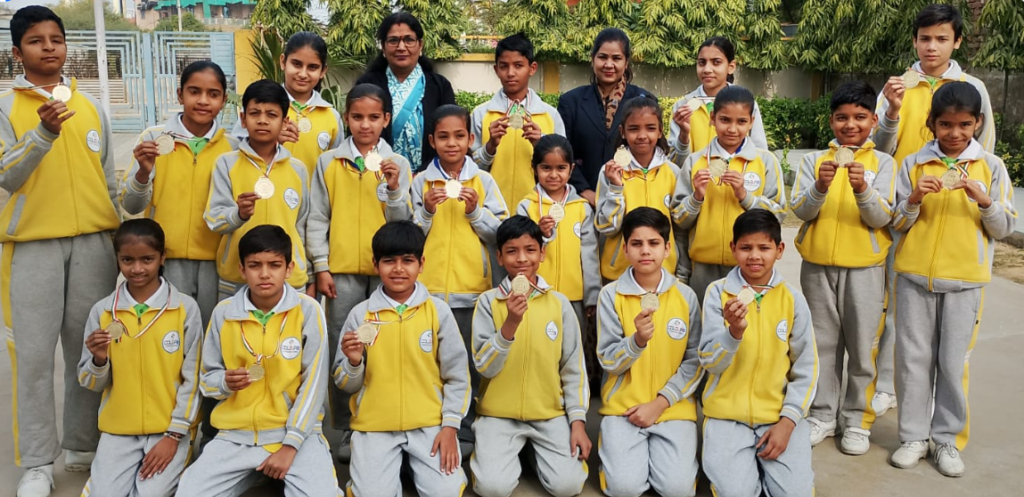 Happy students studying at Colours School after successful admission